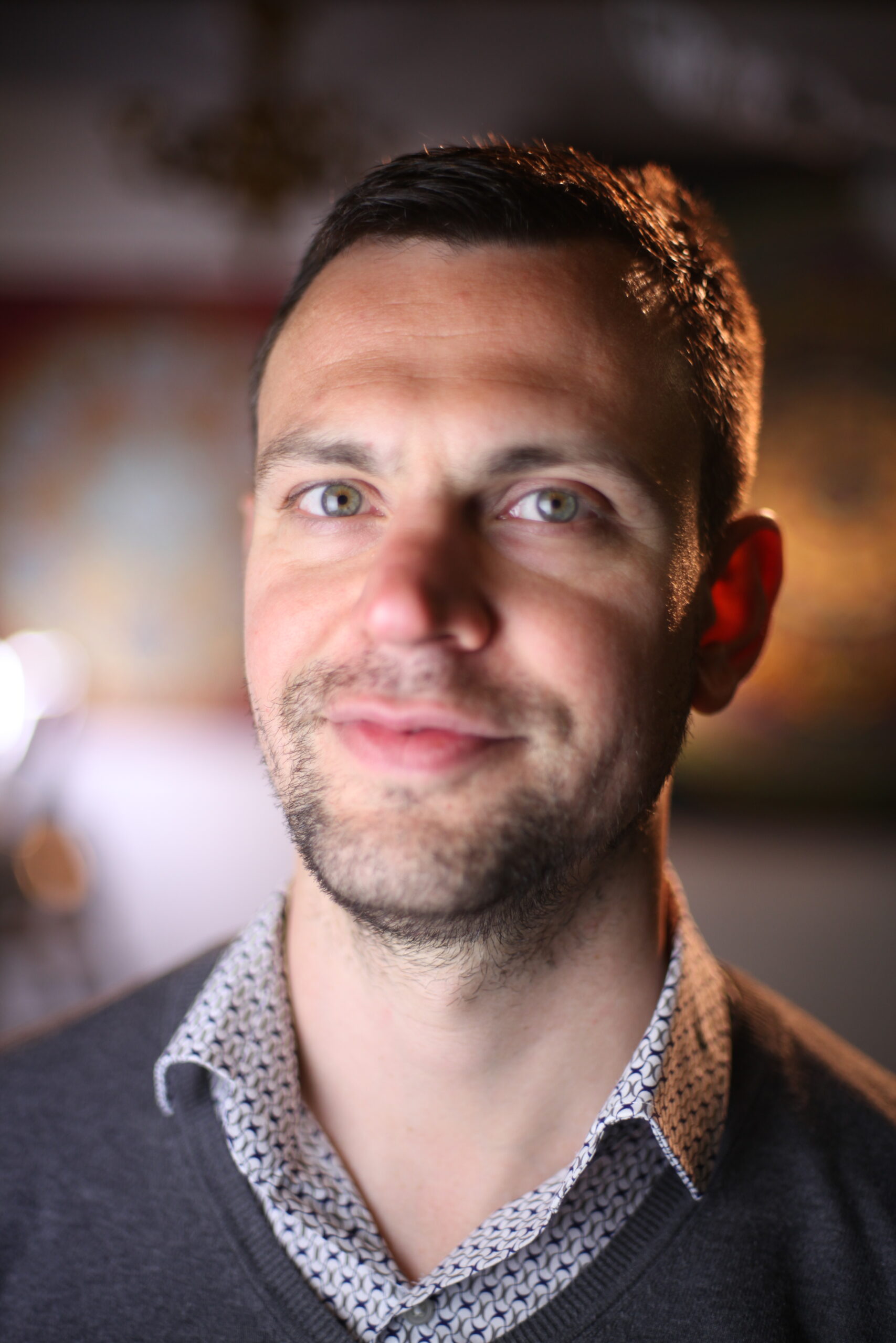 This image has an empty alt attribute; its file name is konrad-photo-scaled.jpg